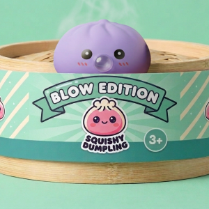 Big Ocean Blue Dumpling Squishy in its bamboo steamer box