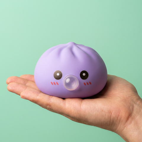 Big Ocean Blue Dumpling Squishy held in hand, actual size