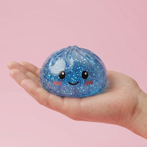 Calm Blue Glitter Dumpling Squishy held in hand, actual size