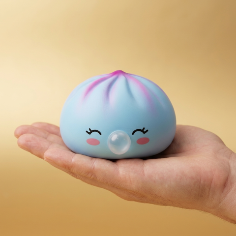 Frost Blue Rare Blow Dumpling Squishy held in hand, actual size