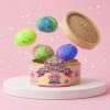 Rainbow Dumpling Squishy being squeezed, soft slow-rise foam