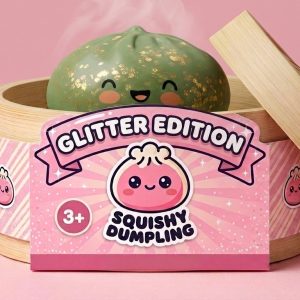 Emerald Green Glitter Dumpling Squishy in its bamboo steamer box