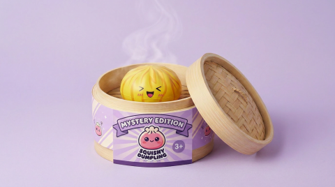 Fluffy Mystery Dumpling Squishy Bun in its bamboo steamer box