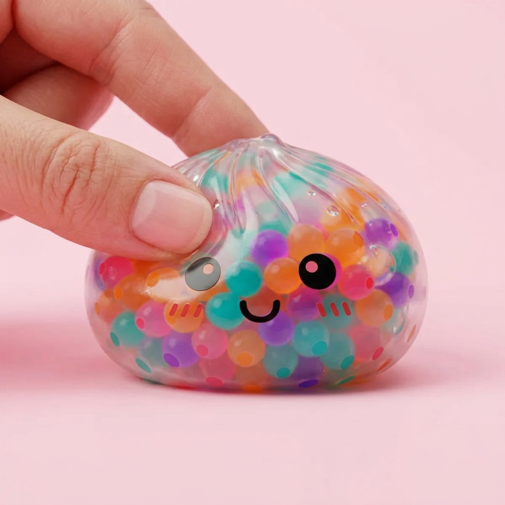 Multicolour Squishy Dumpling being squeezed, soft slow-rise foam