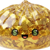 Gold Dumpling Squishy – Rare Edition being squeezed, soft slow-rise foam
