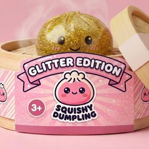 Gold Glitter Dumpling Squishy in its bamboo steamer box