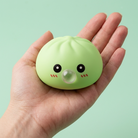 Fresh Green Dumpling Squishy held in hand, actual size