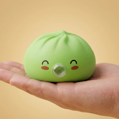 Matcha Green Rare Blow Dumpling Squishy held in hand, actual size