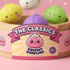 Mystery Dumpling Squishy Blind Box – Set of 12 being squeezed, soft slow-rise foam