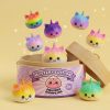 Jumbo Unicorn Rainbow Dumpling Squishy being squeezed, soft slow-rise foam