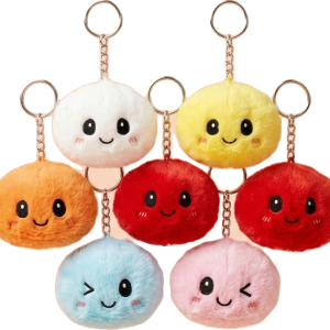 Dumpling Squishy Keyring Set of 6 being squeezed, soft slow-rise foam