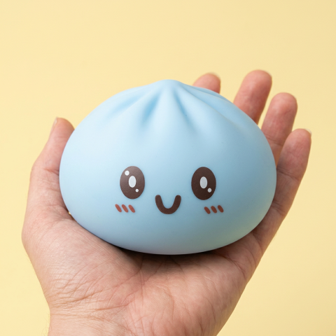 Giant Blue Dumpling Squishy held in hand, actual size