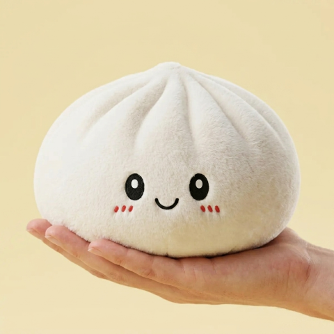 Big Dumpling Squishy Pillow held in hand, actual size