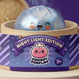 Blue Glacé Sparkle Dumpling Squishy in its bamboo steamer box