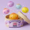Mini Dumpling Squishy Blind Box being squeezed, soft slow-rise foam