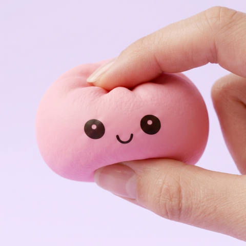 Mini Mystery Dumplings Squishy being squeezed, soft slow-rise foam
