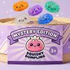 Mystery Bubble Dumpling Squishy being squeezed, soft slow-rise foam