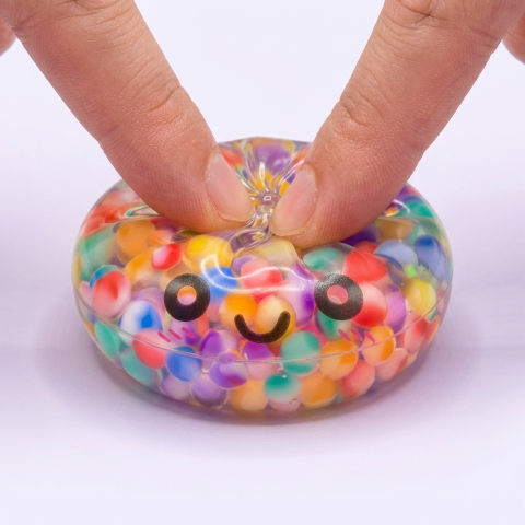 Mystery Bubble Dumpling Squishy being squeezed, soft slow-rise foam