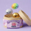 Rare Dumpling Squishy Mystery Box being squeezed, soft slow-rise foam