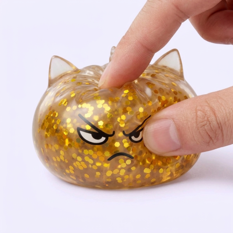 Glitter Dumpling Squishy Rare Unicorn Edition being squeezed, soft slow-rise foam
