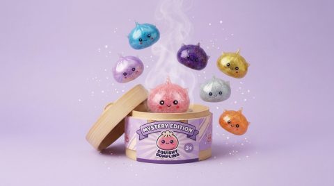 Mystery Unicorn Glitter Dumpling Squishy being squeezed, soft slow-rise foam