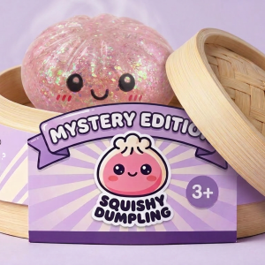 Glitter Surprise Mystery Dumpling Squishy in its bamboo steamer box