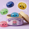 Mystery Glitter Dumpling Squishy Mini Set being squeezed, soft slow-rise foam