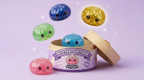 Mystery Glitter Dumpling Squishy Mini Set being squeezed, soft slow-rise foam