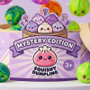 Mystery Tie-Dye Dumpling Squishy Mini being squeezed, soft slow-rise foam