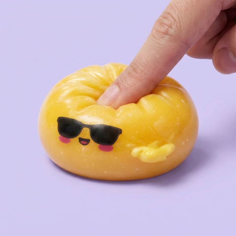 Mystery Dumpling Squishy – Sunglasses Surprise being squeezed, soft slow-rise foam