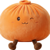 Giant Orange Dumpling Squishy being squeezed, soft slow-rise foam