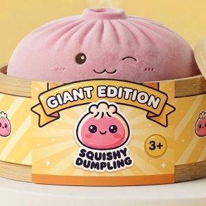Giant Pink Squishy Dumpling Toy in its bamboo steamer box