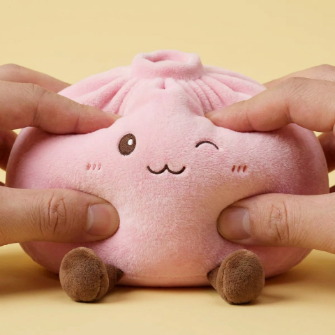 Giant Pink Squishy Dumpling Toy — slow-rise effect, the foam springs back slowly