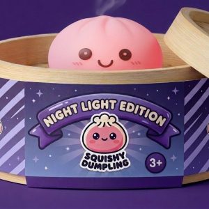 Pink Dumpling Squishy Night Light in its bamboo steamer box