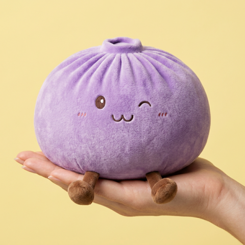 Giant Purple Dumpling Squishy held in hand, actual size