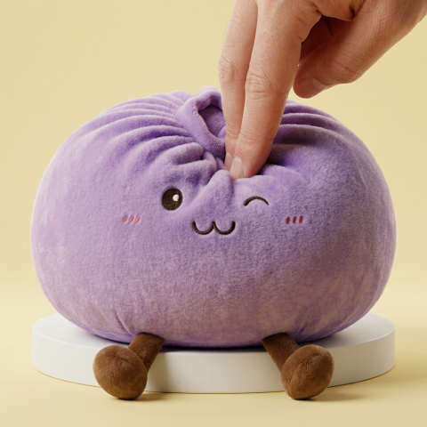Giant Purple Dumpling Squishy being squeezed, soft slow-rise foam