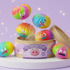 Rainbow Mystery Dumplings Squishy being squeezed, soft slow-rise foam