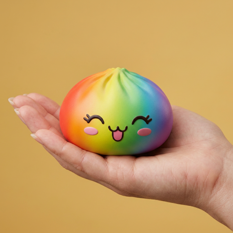 Rare Rainbow Dumpling Squishy held in hand, actual size