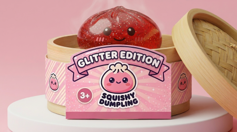 Lucky Red Glitter Dumpling Squishy in its bamboo steamer box