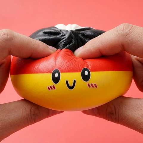Germany Flag Dumpling Squishy Toy — slow-rise effect, the foam springs back slowly