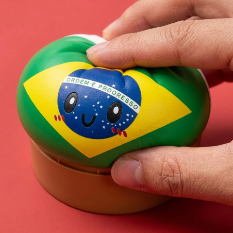 Brazil Flag Dumpling Squishy being squeezed, soft slow-rise foam
