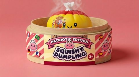 Spain Flag Dumpling Squishy in its bamboo steamer box