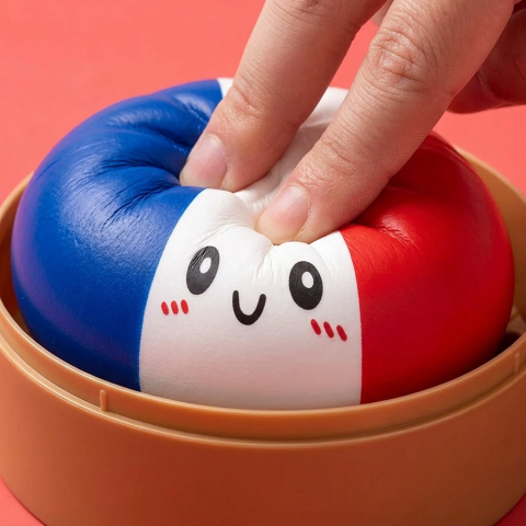 France Flag Dumpling Squishy being squeezed, soft slow-rise foam
