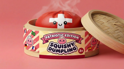Swiss Flag Dumpling Squishy Toy in its bamboo steamer box