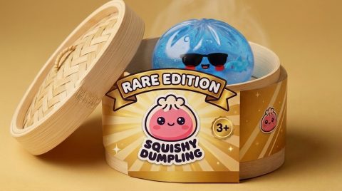 Sunglasses Dumpling Squishy in its bamboo steamer box
