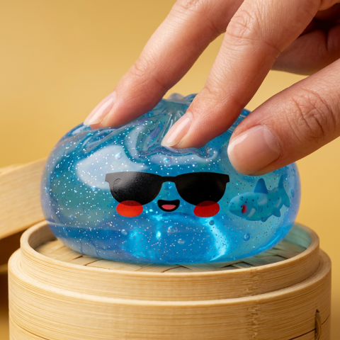 Sunglasses Dumpling Squishy being squeezed, soft slow-rise foam