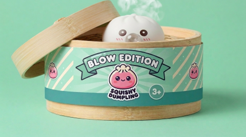 Giant Dumpling Squishy Cloud White in its bamboo steamer box