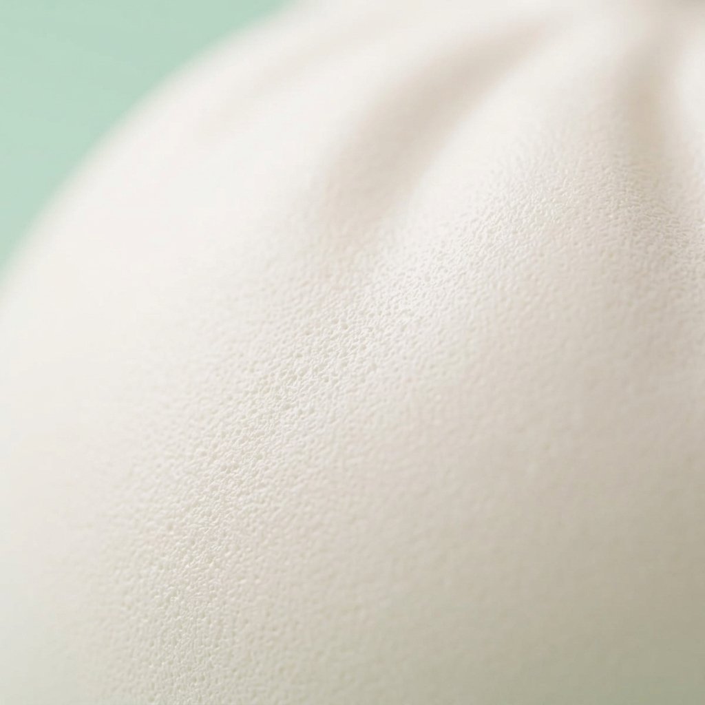Giant Dumpling Squishy Cloud White — close-up of the texture