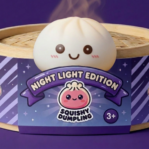 Moonlight White Dumpling Squishy Night Light in its bamboo steamer box