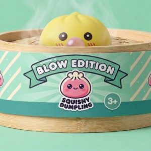 Jumbo Yellow Dumpling Squishy in its bamboo steamer box